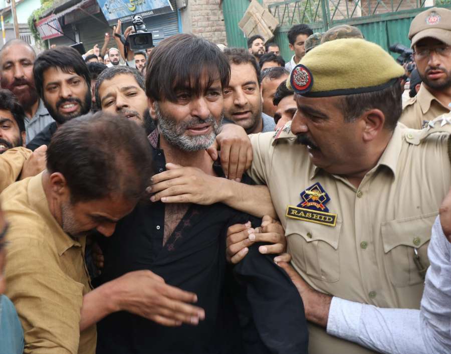 Srinagar: Jammu and Kashmir Liberation Front (JKLF) chairman Muhammad Yasin Malik being arrested by police in Srinagar on July 21, 2017. Malik was arrested after he tried to lead a protest march. (Photo: IANS) by . 