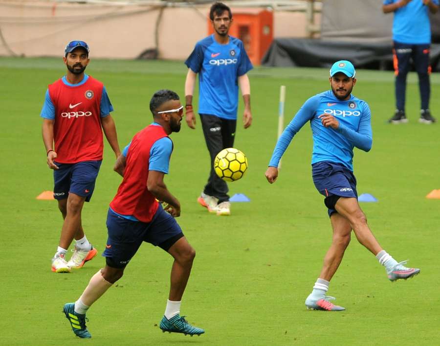 Bengaluru: India Cricket team players during a practice session ahead of the 4th ODI cricket match against Australia at Chinnasawamy Stadium , in Bengaluru on Sept. 26, 2017. (Photo: IANS) by .