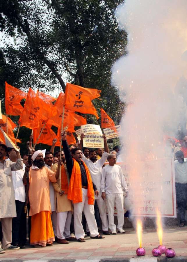 New Delhi: Right Wing Hindu activists stage a demonstration against Supreme Court's ban on the sale of fire crackers in Delhi and NCR this Diwali, in New Delhi, on Oct 13, 2017. The Supreme Court refused to modify its October 9 order banning the sale of fire crackers in Delhi and NCR this Diwali and expressed anguish that its order was being given a communal twist. (Photo: IANS) by . 