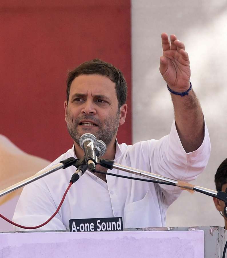 Gandhinagar: Congress Vice President Rahul Gandhi addresses during a public meeting in Gandhinagar on Oct 23, 2017. (Photo: IANS) by .