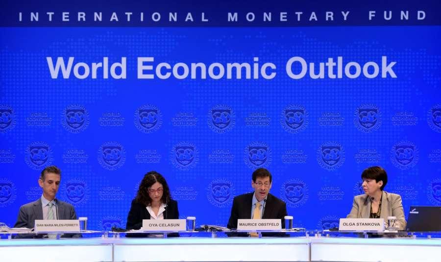 WASHINGTON, Oct. 10, 2017 (Xinhua) --Maurice Obstfeld (2nd R), chief economist at the International Monetary Fund (IMF), attends a press briefing at the IMF headquarters in Washington D.C., the United States, on Oct. 10, 2017. The IMF on Tuesday raised its global growth forecast for 2017 and 2018 due to a broad-based recovery in Europe, China, Japan and the United States. (Xinhua/Yin Bogu/IANS) by .