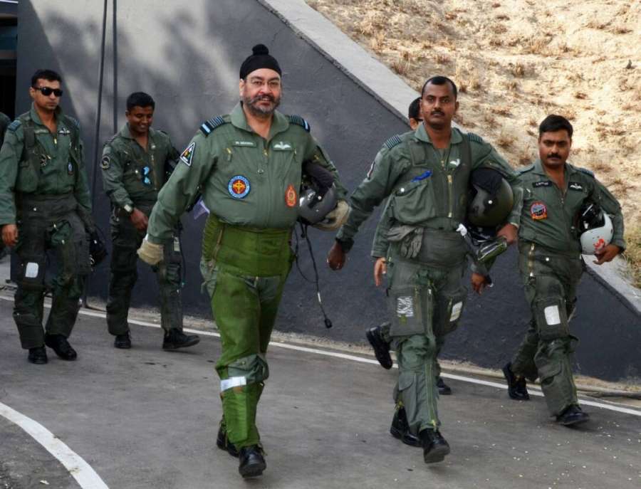 Bhatinda: IAF chief B.S. Dhanoa arrives to fly a MiG-21 at Air Force station in Bhisiana of Punjab's Bhatinda, "to honour the valour and supreme sacrifice of Kargil martyrs" on May 27, 2017. (Photo: IANSâ/DPROâ) by .