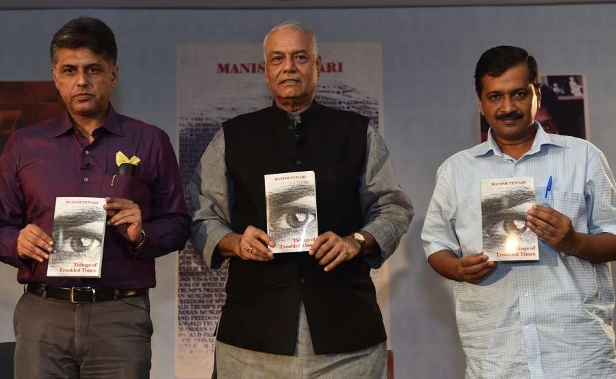 New Delhi: Delhi Chief Minister Arvind Kejriwal and BJP leader Yashwant Sinha at the release of Congress leader Manish Tewari's book "Tidings of Troubled Times" in New Delhi, on Oct 5, 2017. (Photo: IANS) by .