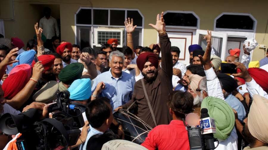 Gurdaspur: Punjab Congress chief Sunil Jakhar along with Navjot Singh Sidhu and other party leaders celebrates after winning by a margin of over 1.93 lakh votes in the recently concluded by polls to the Gurdaspur Lok Sabha seat, in Gurdaspur on Oct 15, 2017. (Photo: IANS) by .