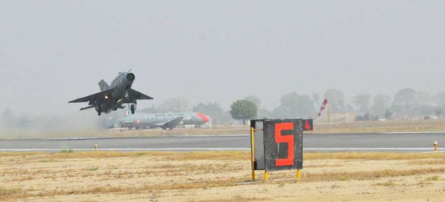 Bhatinda: IAF chief B.S. Dhanoa flies a MiG-21 at Air Force station in Bhisiana of Punjab's Bhatinda, "to honour the valour and supreme sacrifice of Kargil martyrs" on May 27, 2017. (Photo: IANSâ/DPROâ) by .