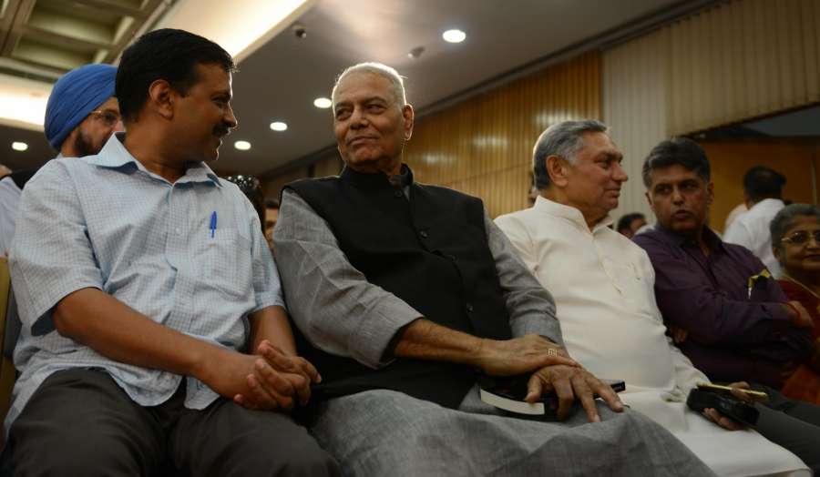 New Delhi: Delhi Chief Minister Arvind Kejriwal and BJP leader Yashwant Sinha at the release of Congress leader Manish Tewari's book "Tidings of Troubled Times" in New Delhi, on Oct 5, 2017. (Photo: IANS) by .