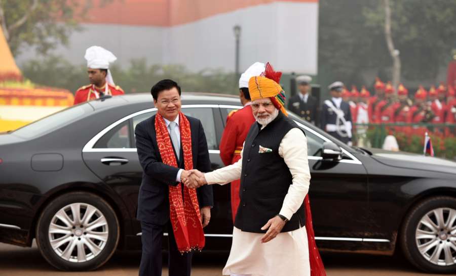 New Delhi: Prime Minister Narendra Modi greets Prime Minister of Laos Thongloun Sisoulith on his arrival at the venue of Republic Day Parade 2018 on Rajpath in New Delhi on Jan 26, 2018. (Photo: IANS/PIB) by . 