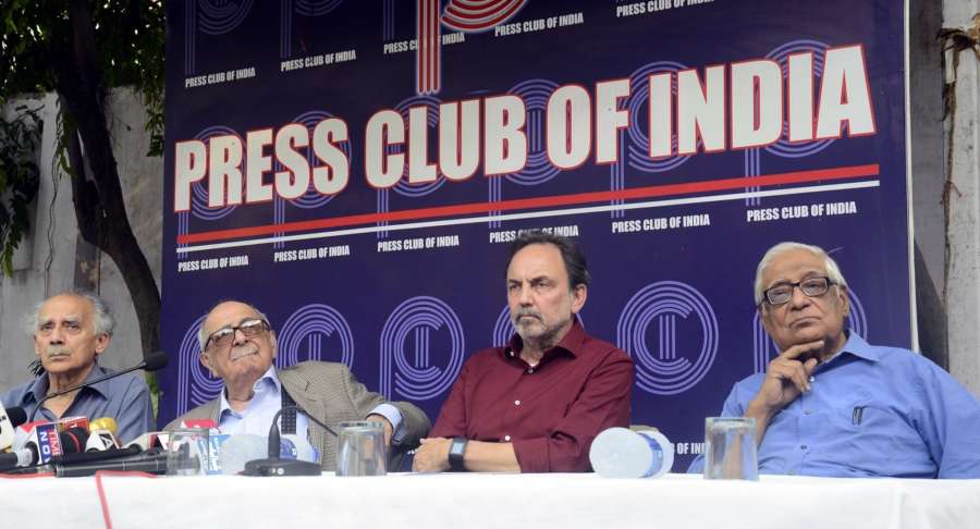 New Delhi: Veteran journalist and former union minister Arun Shourie, Fali Sam Nariman, NDTV co-founder Prannoy Roy and HK Dua during a protest meet organised at the Press Club of India following CBI searches at Roy's houses; in New Delhi, on June 9, 2017. (Photo: IANS) by . 