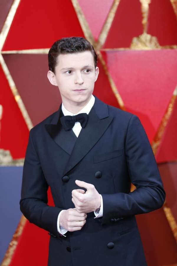 LOS ANGELES, March 5, 2018 (Xinhua) -- Actor Tom Holland arrives for the red carpet of the 90th Academy Awards at the Dolby Theater in Los Angeles, the United States, on March 4, 2018. (Xinhua/Li Ying/IANS) by . 