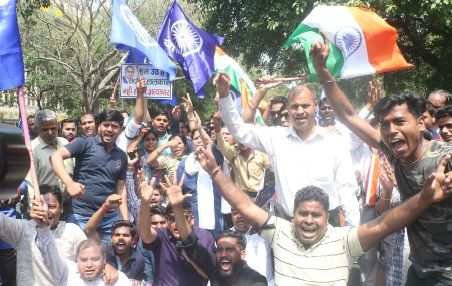 New Delhi: People stage a demonstration during a nation wide strike called to protest against the dilution of the SC/ST Prevention of Atrocities Act in New Delhi, on April 2, 2018. (Photo: Bidesh Manna/IANS) by .