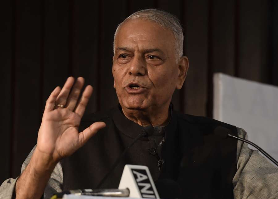 New Delhi: BJP leader Yashwant Sinha addresses at the release of Congress leader Manish Tewari's book "Tidings of Troubled Times" in New Delhi, on Oct 5, 2017. (Photo: IANS) by . 