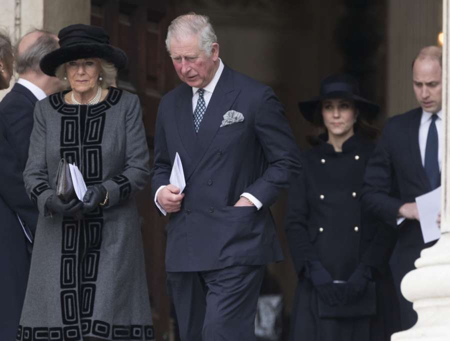 LONDON, Dec. 14, 2017 (Xinhua) -- Prince Charles (2nd L, Front) and his wife Camilla (1st L, Front) leave the Grenfell tower National Memorial Service at St. Paul's Cathedral in London, Britain, on Dec. 14, 2017. A grand memorial service was held Thursday here for the victims of the Grenfell tower fire that claimed 71 lives on June 14. (Xinhua/IANS) by . 