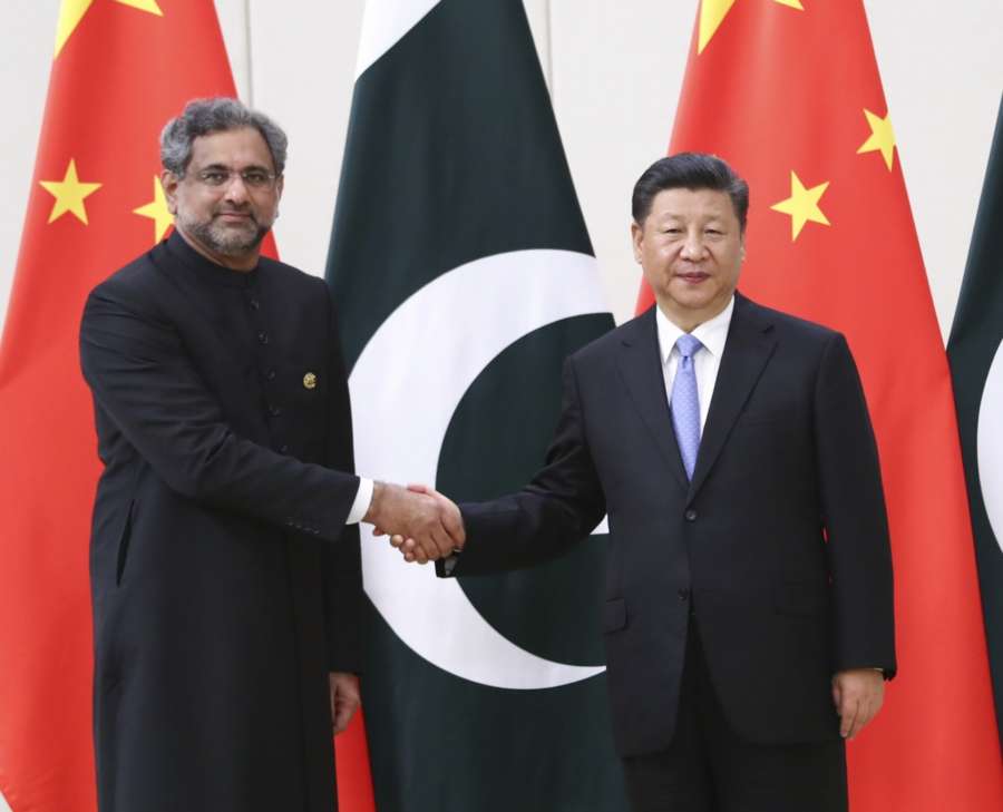 BOAO, April 10, 2018 (Xinhua) -- Chinese President Xi Jinping (R) meets with Pakistani Prime Minister Shahid Khaqan Abbasi in Boao, south China's Hainan Province, April 10, 2018. (Xinhua/Xie Huanchi/IANS) by . 