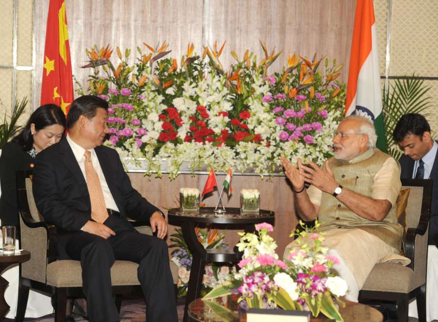 Prime Minister Narendra Modi and Chinese President Xi Jinping during a meeting in Ahmedabad, Gujarat on September 17, 2014. (Photo: IANS/PIB) by . 