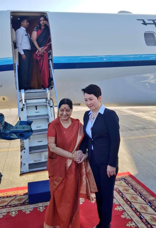 Ulaanbaatar: External Affairs Minister Sushma Swaraj being received by Mongolian Deputy Foreign Minister B. Battsetseg on her arrival in Ulaanbaatar, Mongolia on April 24, 2018. (Photo: IANS/MEA) by .