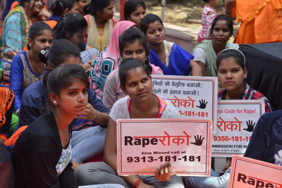 New Delhi: Women and children during an indefinite hunger strike at Rajghat against Unnao and Kathua rape incidents and appeal to the Prime Minister Narendra Modi to pass a law for a death penalty for rape convicts of minor, in New Delhi on April 13, 2018. (Photo: IANS) by . 