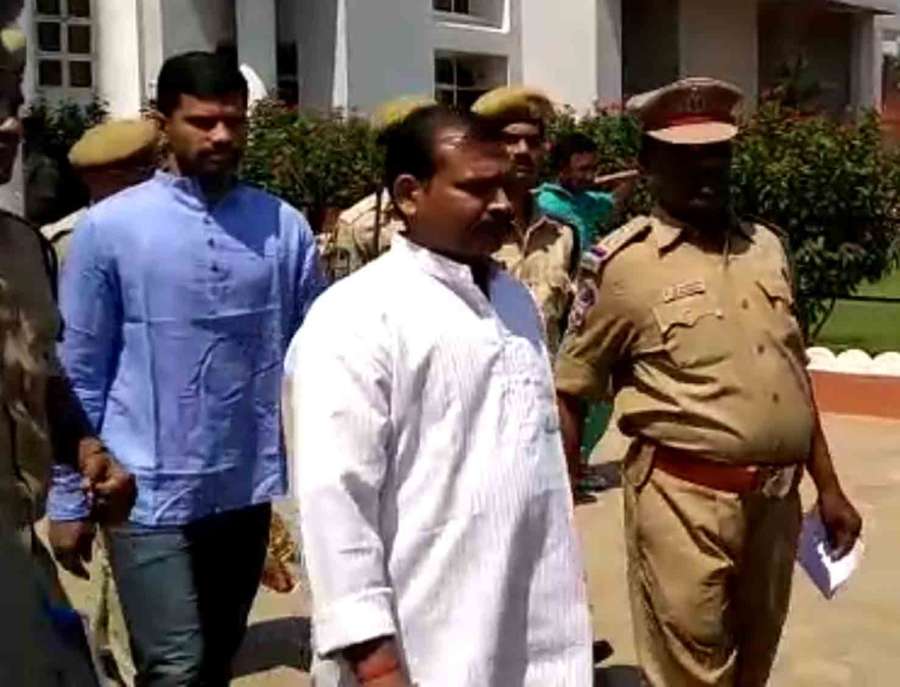 Hyderabad: Swami Aseemanand and other accused in the 2007 Makkah Masjid bomb blast case, walks out of court premises in Hyderabad on April 16, 2018. A special National Investigation Agency (NIA) court acquitted all five accused in the 2007 Makkah Masjid bomb blast case. (Photo: IANS) by . 