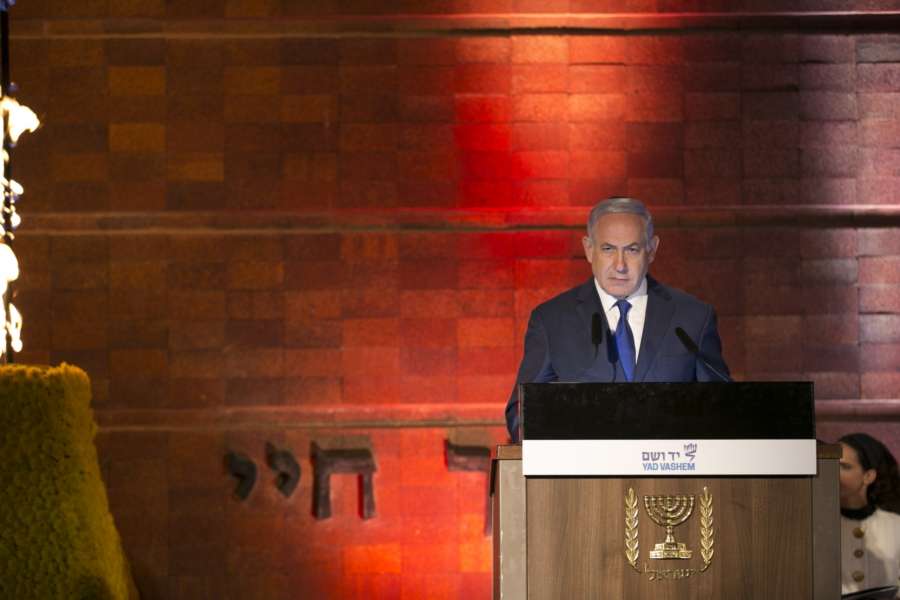 JERUSALEM, April 11, 2018 (Xinhua) -- Israeli Prime Minister Benjamin Netanyahu speaks at an official ceremony marking the Holocaust Remembrance Day at Yad Vashem World Holocaust Remembrance Center in Jerusalem, on April 11, 2018. Israel marked its annual day of Holocaust remembrance on Wednesday evening with an official ceremony held in Jerusalem. (Xinhua/Du Zhen/IANS) by . 