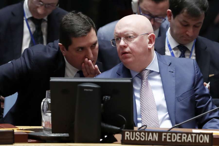 UNITED NATIONS, April 9, 2018 (Xinhua) -- Russian Ambassador to the United Nations Vassily Nebenzia (front) listens to Vladimir Safronkov (L, 2nd row), Russian deputy ambassador to UN, during the UN Security Council meeting on the situation in Syria at the UN headquarters in New York, April 9, 2018. The Security Council held an emergency session on the situation in Syria, particularly after reports of the use of chemical weapons over the weekend in rebel-held Douma near the capital city of Damascus. (Xinhua/Li Muzi/IANS) by . 