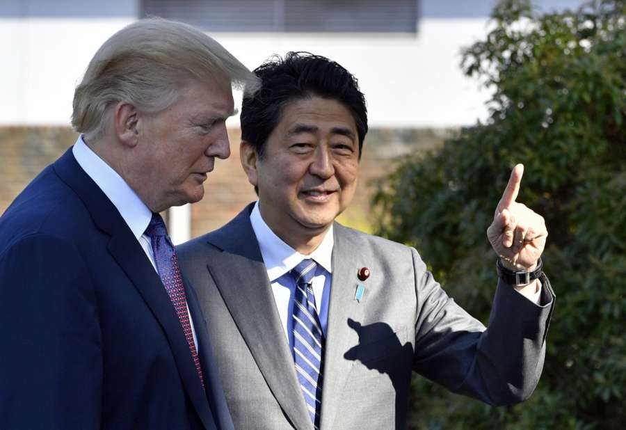 TOKYO, Nov. 5, 2017 (Xinhua) -- U.S. President Donald Trump (L) is greeted by Japanese Prime Minister Shinzo Abe upon his arrival at the Kasumigaseki Country Club in Kawagoe, near Tokyo, Japan, Nov. 5, 2017. (Xinhua/IANS) by . 