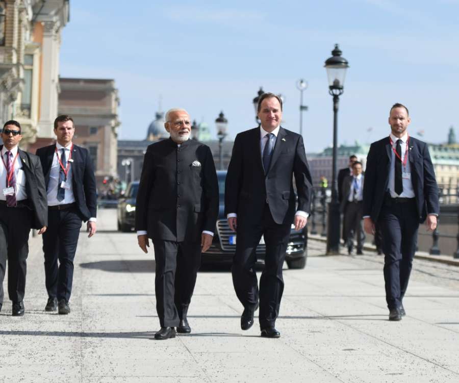 Stockholm: Prime Minister Narendra Modi and his Swedish counterpart Stefan Lofven take a short walk from Sager House to Rosenbad, in Stockholm, Sweden on April 17, 2018. (Photo: IANS/PIB) by . 