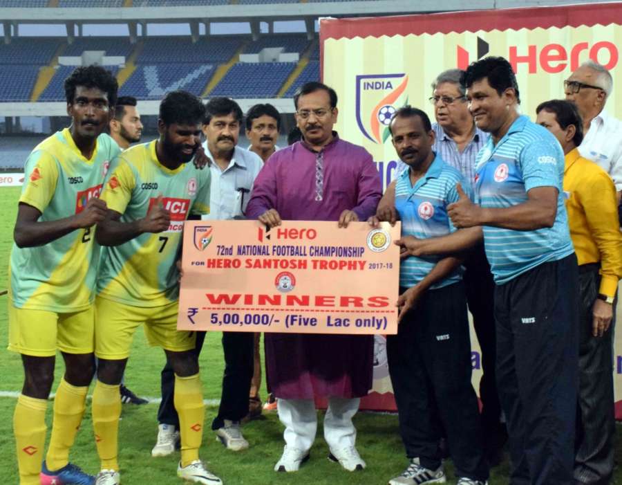 Kolkata: Players of Kerala during the post match presentation ceremony after winning Santosh Trophy match against Bengal at the Vivekananda Yuvabharati Krirangan in Kolkata on April 1, 2018. Kerala beat defending champions Bengal 4-2 in the tie-breaker after the final ended 2-2 in extra time to win the 72nd edition of the Santosh Trophy football tournament. (Photo: IANS) by . 