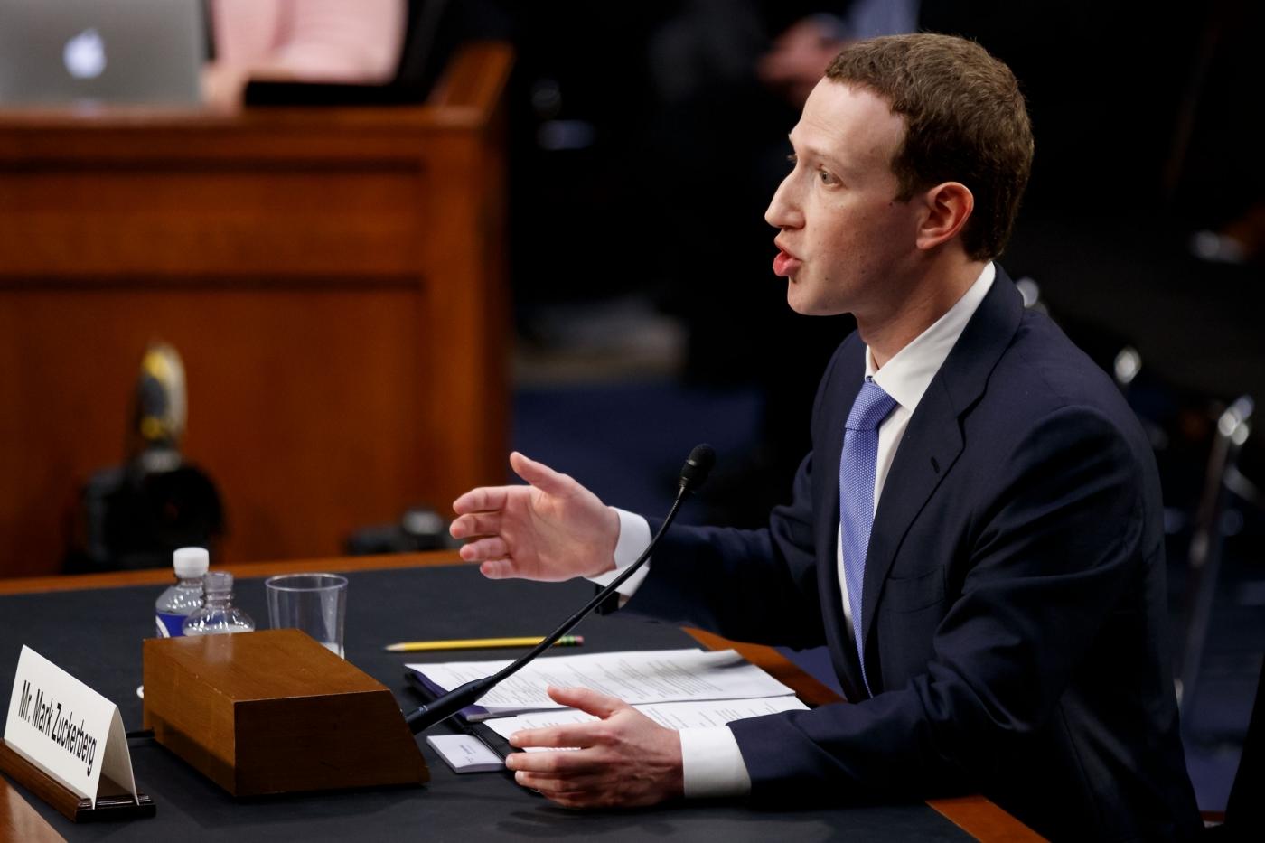 WASHINGTON, April 10, 2018 (Xinhua) -- Facebook CEO Mark Zuckerberg testifies at a joint hearing of the Senate Judiciary and Commerce committees on Capitol Hill in Washington D.C., United States, on April 10, 2018. Facebook CEO Mark Zuckerberg told Congress in written testimony on Monday that he is "responsible for" not preventing the social media platform from being used for harm, including fake news, foreign interference in elections and hate speech. (Xinhua/Ting Shen/IANS) by .