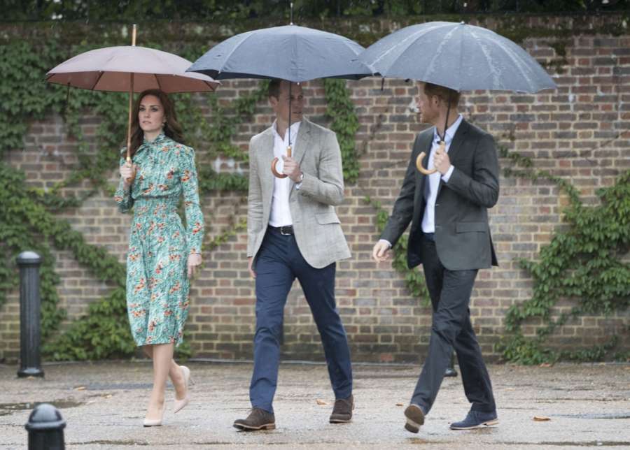 LONDON, Aug. 30, 2017 (Xinhua) -- Prince William (C), the Duke of Cambridge, and his wife Catherine, the Duchess of Cambridge and Prince Harry arrive at the White Garden in the grounds of Kensington Palace in London, Britain on Aug. 30, 2017 to commemorate the 20th anniversary of the death of Princess Diana. (Xinhua/IANS) by . 