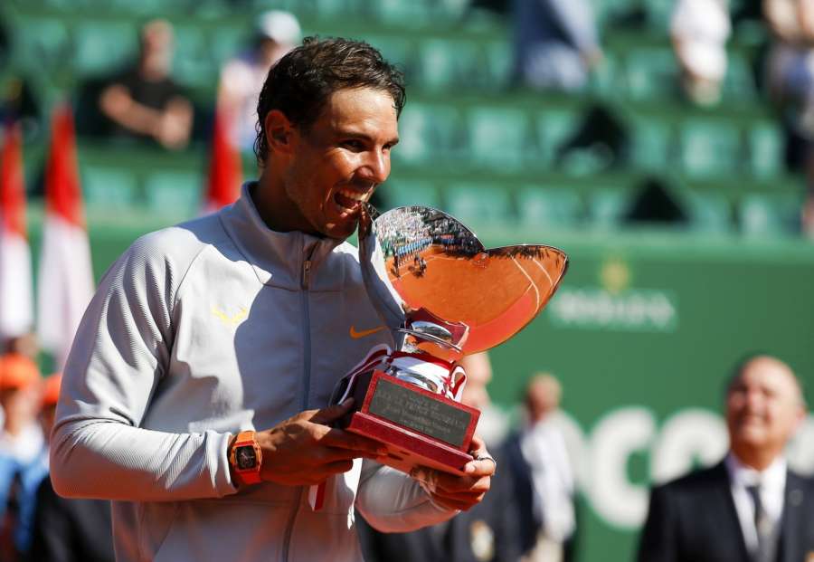 ROQUEBRUNE-CAP-MARTIN, April 23, 2018 (Xinhua) -- Rafael Nadal of Spain poses with his trophy during the awarding ceremony after the final against Kei Nishikori of Japan at the 2018 Monte-Carlo Masters in Roquebrune-Cap-Martin, France on April 22, 2018. Rafael Nadal claimed the title by defeating Kei Nishikori with 2-0. (Xinhua/Nicolas Marie/IANS) by . 