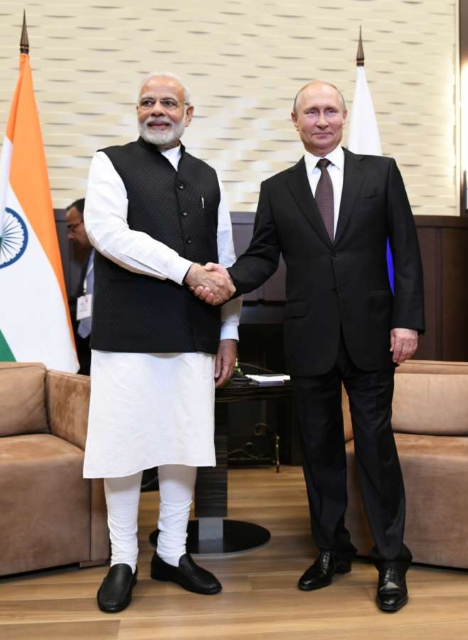 Sochi: Prime Minister Narendra Modi meets Russian President Vladimir Putin in Sochi, Russia on May 21, 2018. (Photo: IANS/MEA) by .