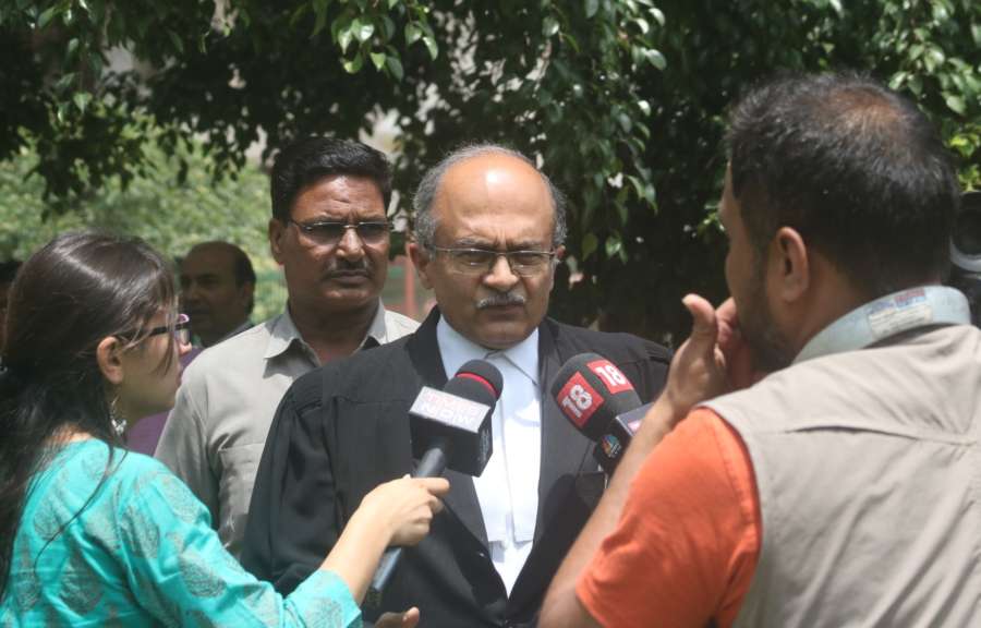New Delhi: Lawyer Prashant Bhushan addressing media on CJI impeachment case at Supreme Court lawn in New Delhi on May 8, 2018. (Photo: IANS) by . 