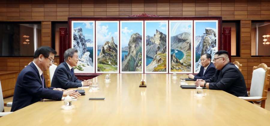 Panmunjom: In this photo provided by Cheong Wa Dae, South Korean President Moon Jae-in (2nd from L) speaks with North Korean leader Kim Jong-un (R) during their summit at Tongilgak on the northern side of Panmunjom in the Demilitarized Zone on May 26, 2018. Next to Moon is South Korea's National Intelligence Service chief Suh Hoon. To Kim Jong-un's right is Kim Yong-chol, a vice chairman of the central committee of the Workers' Party Korea and head of the North's United Front Department handling inter-Korean relations. (Yonhap/IANS) by . 