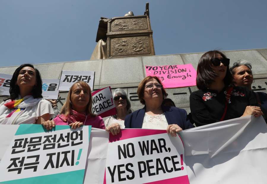 Seoul: A group of peace activists, including Northern Irish peace activist and Nobel Peace Prize laureate Mairead Maguire (3rd from L), rallies in Seoul on May 25, 2018, to call for the United States to hold a summit with North Korea as scheduled. U.S. President Donald Trump called off his meeting with North Korean leader Kim Jong-un on June 12, citing the North's "tremendous anger and open hostility." (Yonhap/IANS) by . 