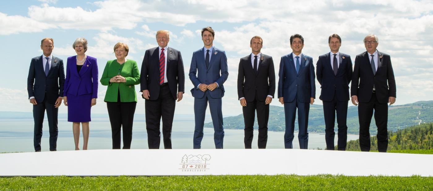 LA MALBAIE, June 8, 2018 (Xinhua) -- Participants of the Group of Seven (G7) summit European Union Council President Donald Tusk, British Prime Minister Theresa May, German Chancellor Angela Merkel, U.S. President Donald Trump, Canadian Prime Minister Justin Trudeau, French President Emmanuel Macron, Japanese Prime Minister Shinzo Abe, Italian Prime Minister Giuseppe Conte and European Commission President Jean-Claude Juncker (from L to R) pose for a group photo on the first day of the G7summit in La Malbaie, Quebec, Canada, June 8, 2018. The Group of Seven (G7) summit, which kicked off here on Friday, is expected to be a tough meeting between the United States and its allies amid raising concerns over U.S. tariffs on steel and aluminum imports. (Xinhua/IANS) by . 