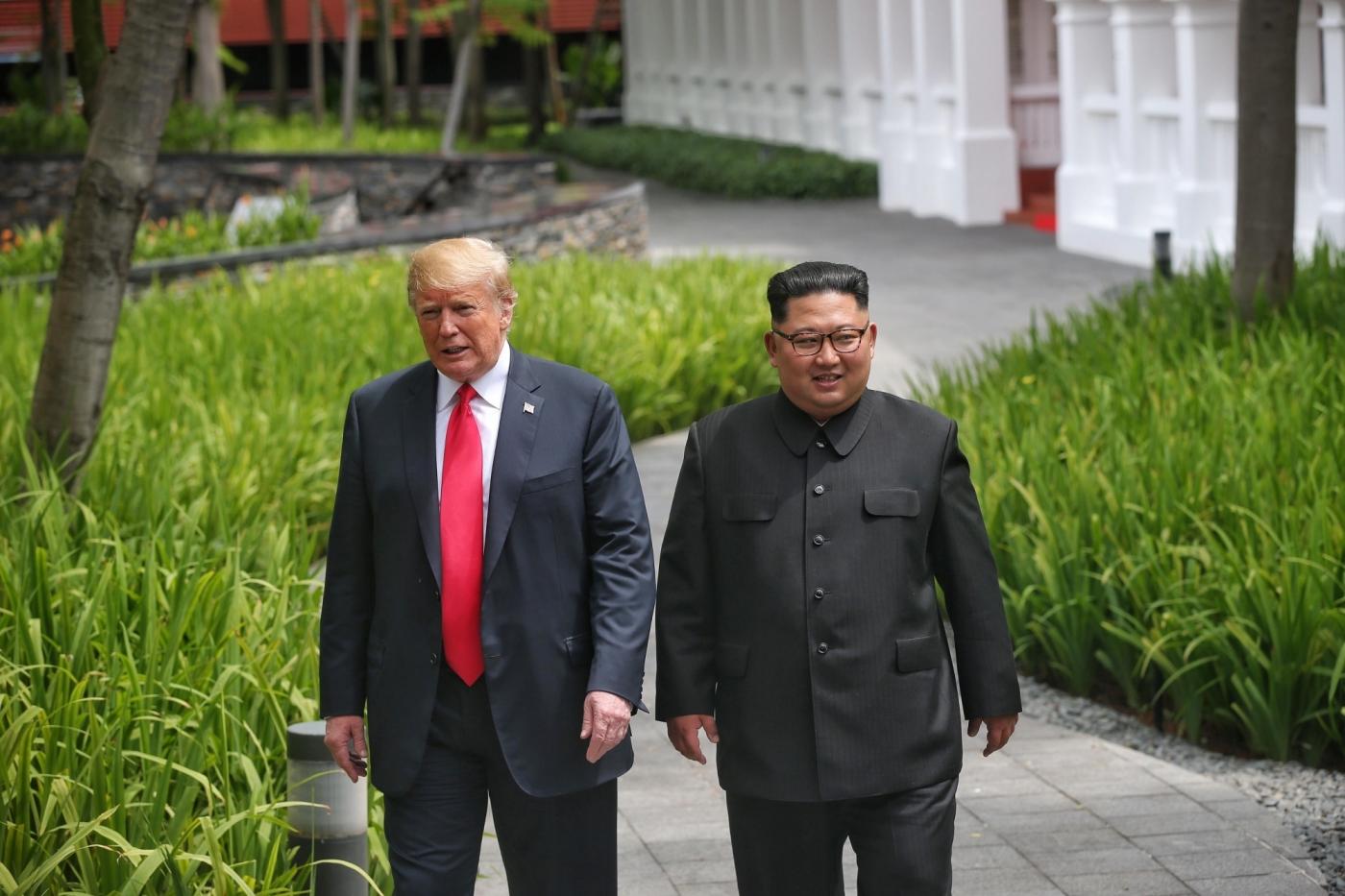 SINGAPORE, June 12, 2018 (Xinhua) -- Top leader of the Democratic People's Republic of Korea (DPRK) Kim Jong Un (R) and U.S. President Donald Trump take a walk during their summit meeting in Singapore on June 12, 2018. (Xinhua/Ministry of Communication and Information of Singapore/IANS) by .