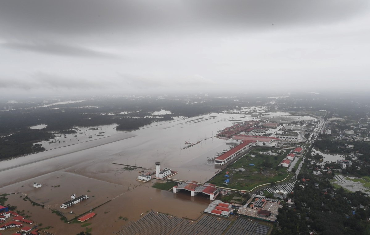 Kerala: An aerial view of the flood-hit areas of Kerala on Aug 18, 2018. Overflowing rivers and a series of landslides have caused the death of 180 people as of Saturday morning, with over three lakh people forced to move to some 2,000 relief camps. The disaster has triggered an unprecedented rescue and relief operation led by the Army, the Air Force and the Navy along with teams of National Disaster Response Force involving about 1,300 personnel and 435 boats. Prime Minister Narendra Modi on Saturday announced Rs 500 crore financial assistance for flood-ravaged Kerala. (Photo: IANS/PIB) by .