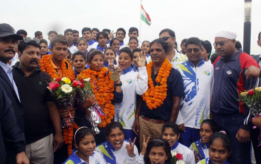 Bhopal: Harshita Tomar who won bronze in the Open Laser 4.7 category of Asian Games 2018 being accorded a grand welcome at Raja Bhoj Airport in Bhopal on Sept 2, 2018. (Photo: IANS) by . 