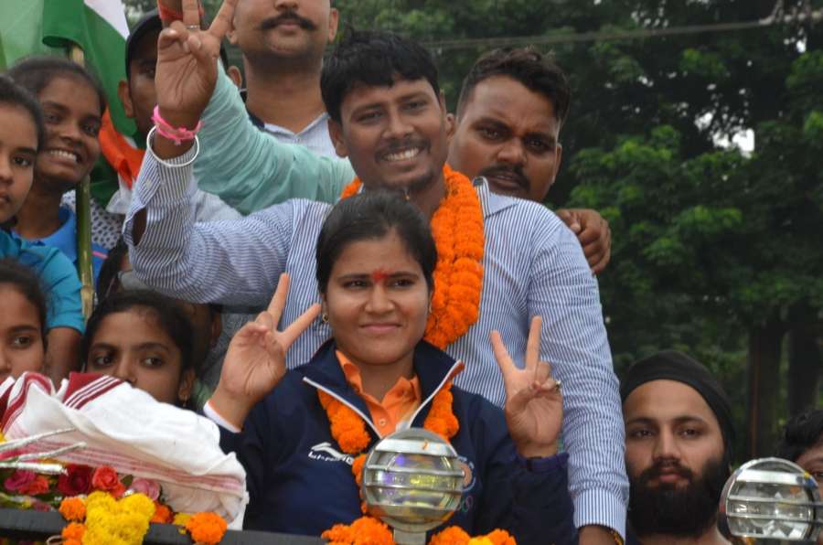 Ranchi: Indian archer Madhumita accorded warm welcome on her arrival in Ranchi on Sept 1, 2018. Madhumita clinched the silver medal in Compound Women's Team category at the ongoing 18th Asian games in Jakarta, Indonesia. (Photo: IANS) by . 