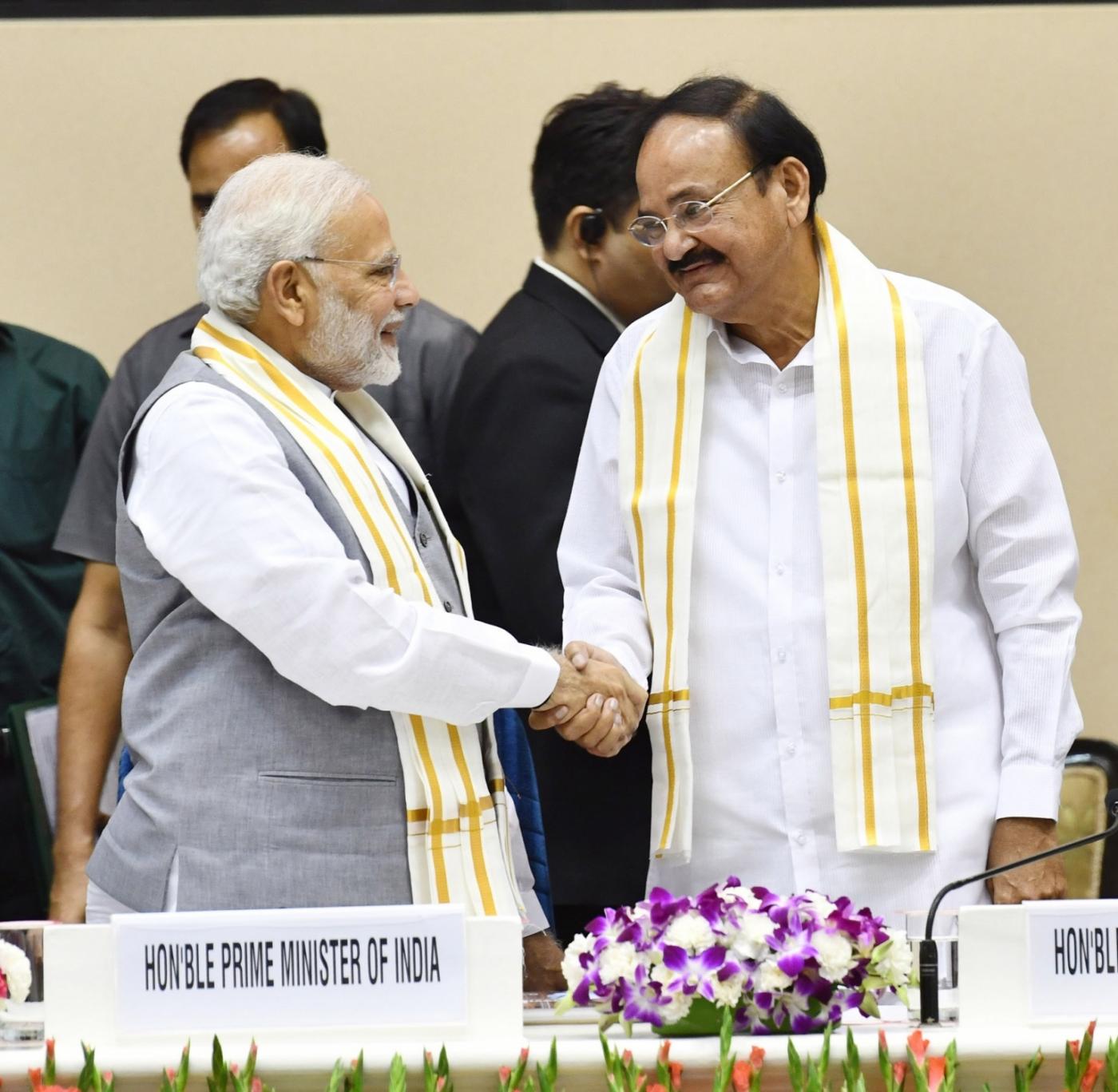 New Delhi: Prime Minister Narendra Modi and Vice President and Rajya Sabha Chairman M. Venkaiah Naidu at the launch of "Moving On... Moving Forward: A Year In Office" - a book marking the completion of Naidu's one year as the Vice President and the Rajya Sabha Chairman; in New Delhi on Sept 2, 2018. (Photo: IANS/PIB) by .