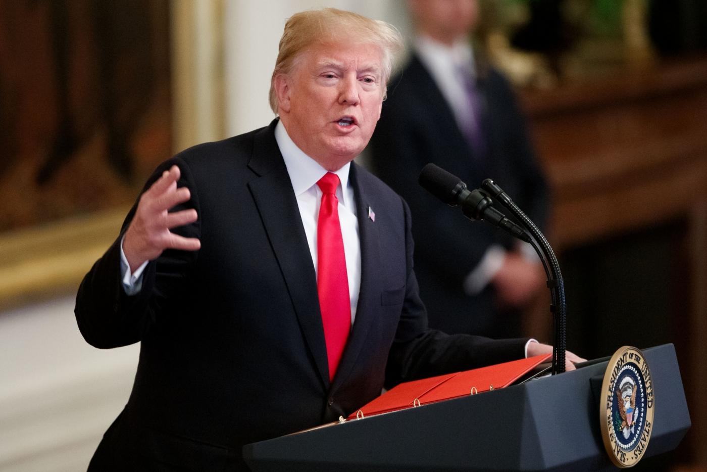 WASHINGTON, Oct. 24, 2018 (Xinhua) -- U.S. President Donald Trump speaks at an event on opioid abuse at the White House in Washington D.C., the United States, on Oct. 24, 2018. Donald Trump on Wednesday vowed to take a thorough investigation into a series of attempted mail attacks targeting former President Barack Obama, the Clintons, CNN and others. (Xinhua/Ting Shen/IANS) by .