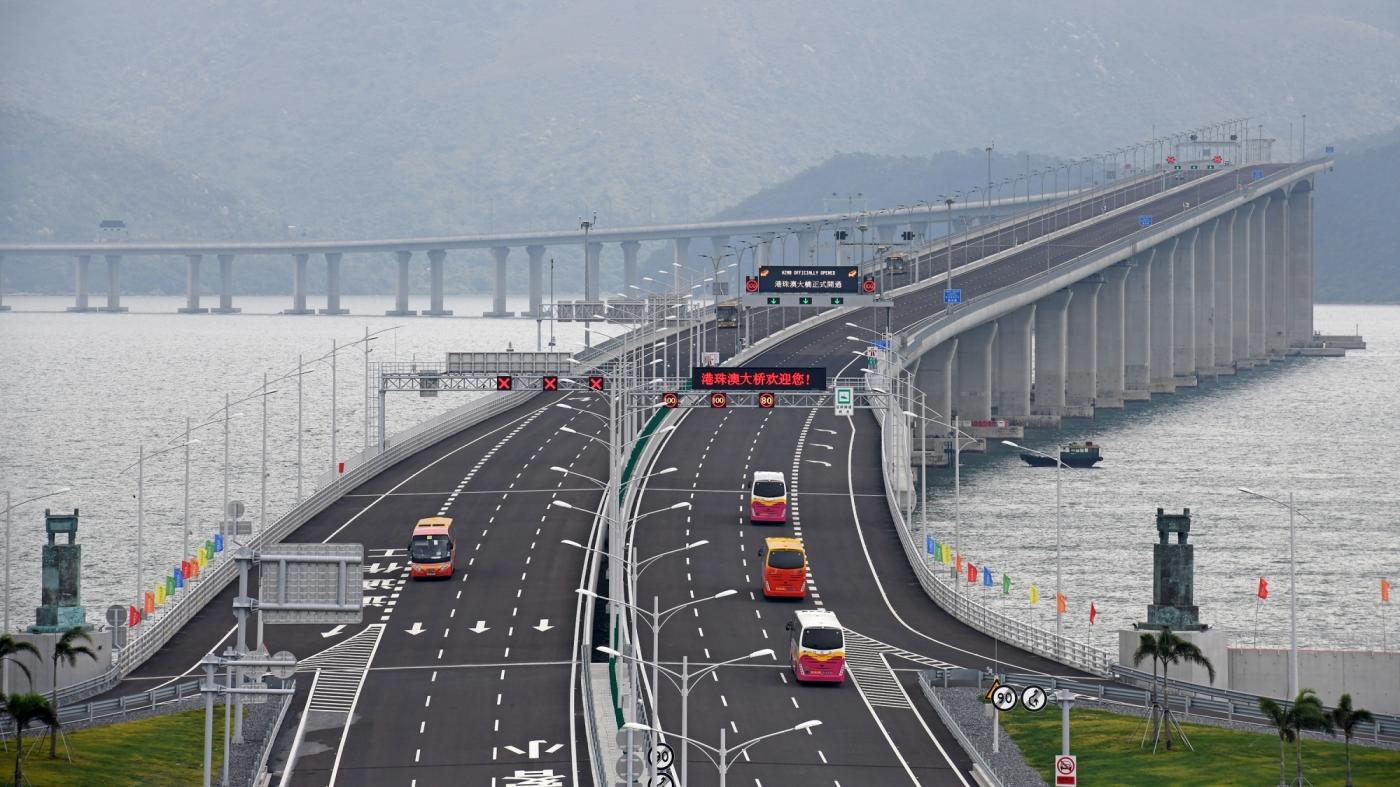 ZHUHAI, Oct. 24, 2018 (Xinhua) -- Cars run on the Hong Kong-Zhuhai-Macao Bridge, Oct. 24, 2018. The Hong Kong-Zhuhai-Macao bridge, the world's longest cross-sea bridge, opened to public traffic at 9 a.m. Wednesday. (Xinhua/Liang Xu/IANS) by . 
