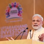 Dehradun: Prime Minister Narendra Modi addresses at the Uttarakhand Investors Summit 2018 in Dehradun, Uttarakhand on Oct 7, 2018. (Photo: IANS/PIB) by . 