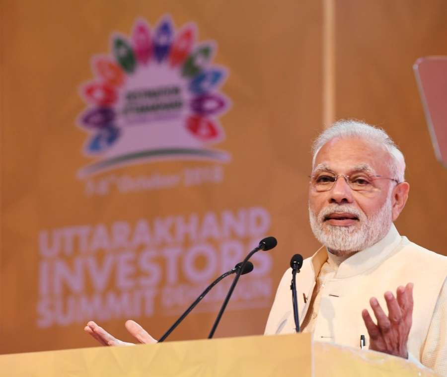 Dehradun: Prime Minister Narendra Modi addresses at the Uttarakhand Investors Summit 2018 in Dehradun, Uttarakhand on Oct 7, 2018. (Photo: IANS/PIB) by . 