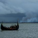 Dakhinpara: Rohingya refugees arrive at Shah Porir Dwip in Dakhinpara ofBangladesh from Rasidong in Myanmar, on Sept 13, 2017. (Photo: bdnews24/IANS) by .