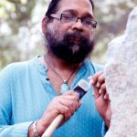 Adwaita Garanayak sculpting the memorial. by .