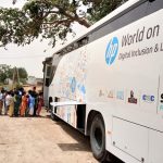 Students ready to board "HP World on Wheels" (WoW), buses that are already driving digital literacy in rural India. by . 