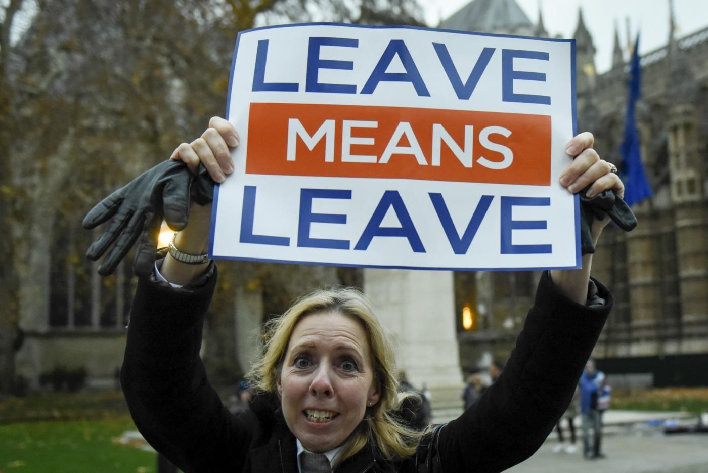 LONDON, Dec. 4, 2018 (Xinhua) -- A pro-Brexit supporter is seen outside the House of Commons in London, Britain, on Dec. 4, 2018. British Prime Minister Theresa May said the five day Brexit debate which started Tuesday evening in the House of Commons will set the course Britain takes for decades to come. Next Tuesday MPs will vote on whether to support or reject a deal agreed between May's government and the European Union on Britain's future relationship with Brussels. (Xinhua/Stephen Chung/IANS) by . 