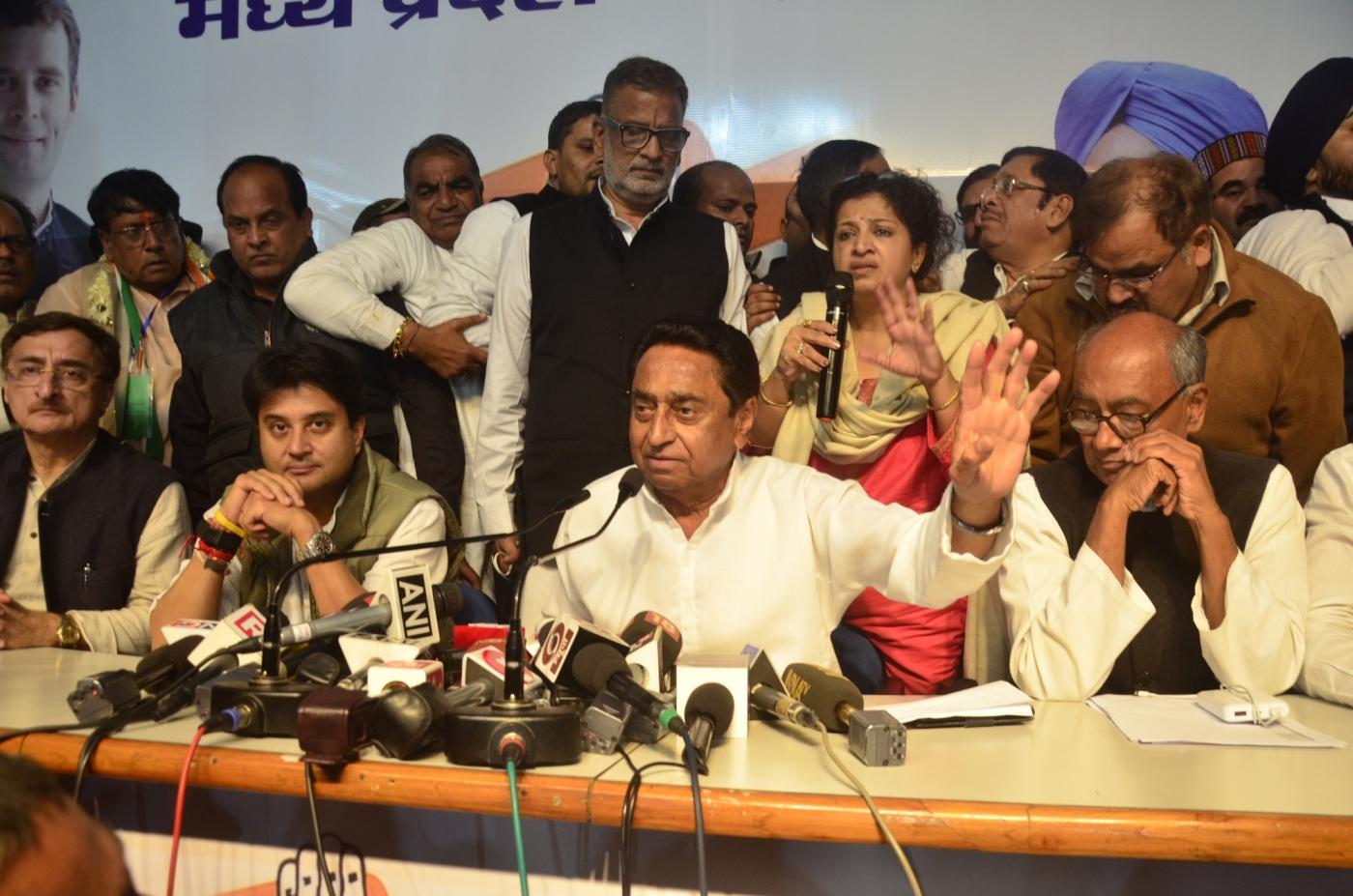 Bhopal: Congress leaders Digvijay Singh, Kamal Nath and Jyotiraditya Scindia during a press conference in Bhopal on Dec 12, 2018. The party is all set to form the government in Madhya Pradesh with the support of three MLAs of the Bahujan Samaj Party (BSP) and the Samajwadi Party (SP) and four Independents.(Photo: IANS) by . 