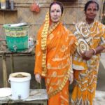 Sumitra Biswas (L) and her daughter (R). by .