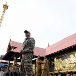 Pathanamthitta: A security personnel stands guard at the Sabarimala temple in Kerala's Pathanamthitta district on Nov 17, 2018. A Hindu group on Saturday called for a shutdown in Kerala following the "detention" of few religious leaders the previous night from the Sabarimala temple premises. The most prominent among the detained on Friday night were Hindu Iykavedi (HI) President and senior BJP leader K.P. Sasikala. She was detained while proceeding towards the Lord Ayyappa shrine. (Photo: IANS) by .